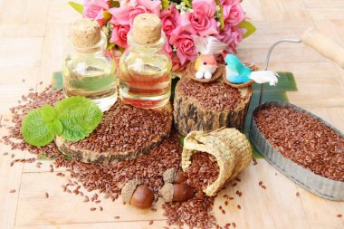 Keten tohumu ve yağı keten ahşap arka plan üzerinde