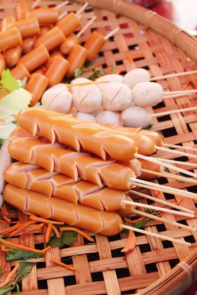 Meatballs and sausages steamed in the market — Stock Photo, Image