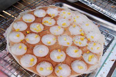 Hindistan cevizi sütü karıştırın şeker ve un, Tay tatlı