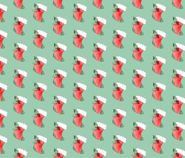 Kusursuz desenli suluboya Noel çorabı. Kağıda elle çizilmiş..
