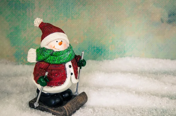 Bonitinho boneco de neve figura esqui — Fotografia de Stock