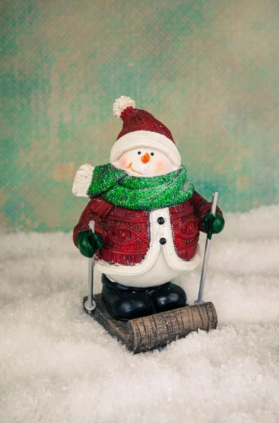 Bonitinho boneco de neve figura esqui — Fotografia de Stock