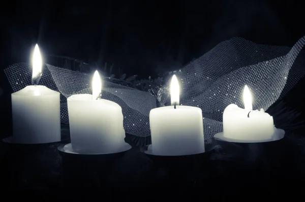 Cuatro velas encendidas — Foto de Stock