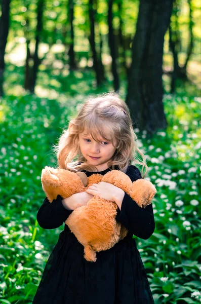 Girl with teddy-bear toy — Stock Photo, Image