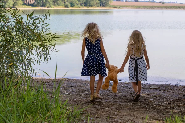 Two Little Girls Long Blond Hair Holding Teddy Bear Toy — Stock Photo, Image