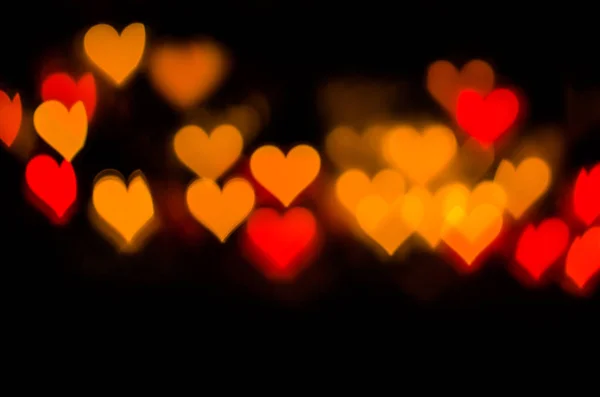 Cuore Colorato Bokeh Contro Sfondo Scuro — Foto Stock