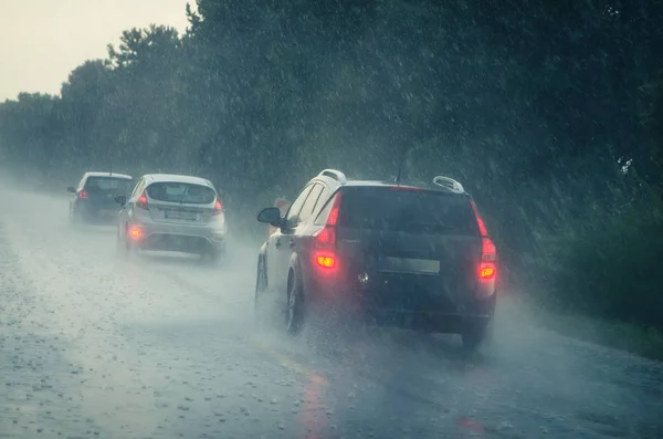 Cars in dangerous slippery highway — Stock Photo, Image