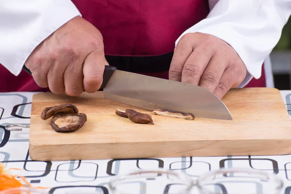 Chef cutting mushroom — Stock Photo, Image