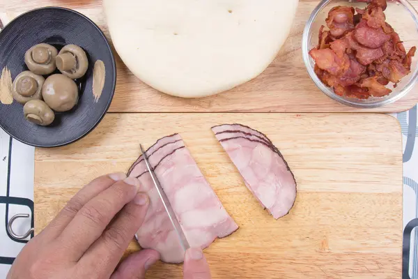 Chef slicing Ham — Stock Photo, Image