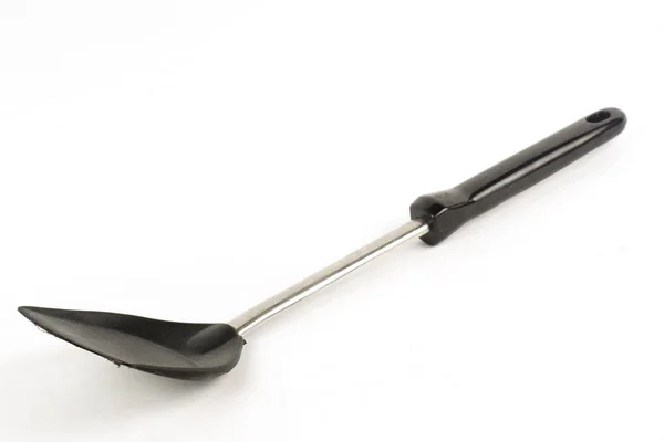 Plastic spade of frying pan — Stock Photo, Image