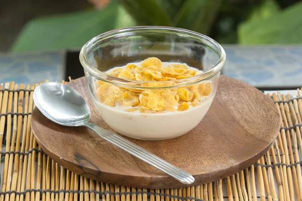 Cornflakes with milk on the  cup — Stock Photo, Image