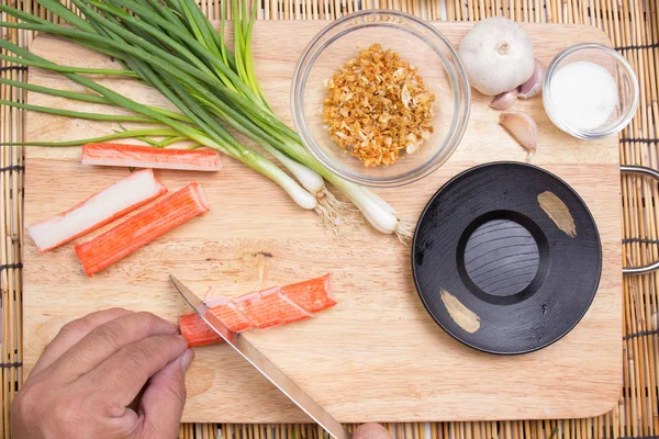 Chef cutting crab imitation