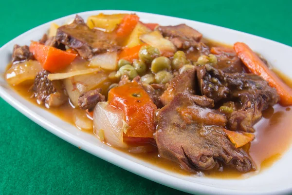 Pork tongue stew on the plate — Stock Photo, Image