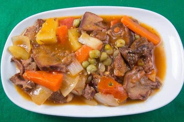 Pork tongue stew on the plate — Stock Photo, Image