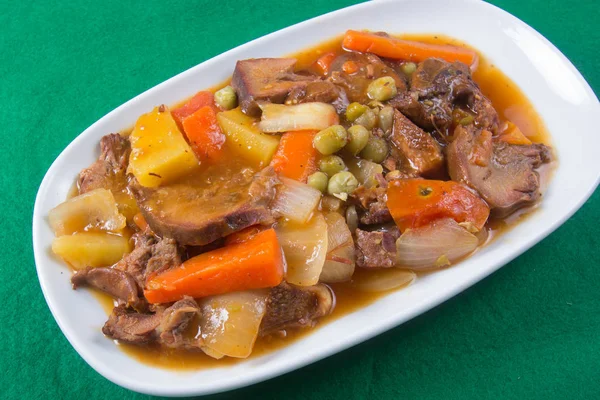 Pork tongue stew on the plate — Stock Photo, Image