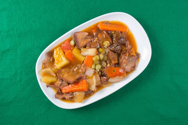 Pork tongue stew on the plate — Stock Photo, Image