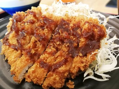 Crispy deep fried pork with rice 