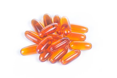 Beyaz zemin üzerinde lecithin / vitamin takviyeli kapsüller