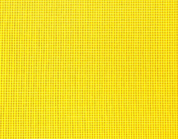 Textured yellow natural fabric .