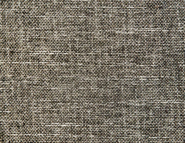 Textured grey natural fabric .