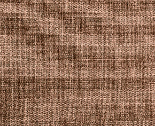 Textured brown natural fabric .
