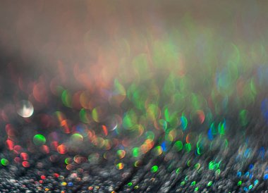 Siyah arkaplanda su damlacıklarının parıltısı