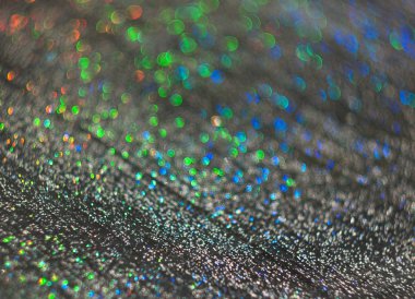 Siyah arkaplanda su damlacıklarının parıltısı