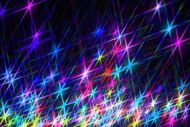 Karanlık arka planda parlayan yıldızlar