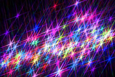 Karanlık arka planda parlayan yıldızlar