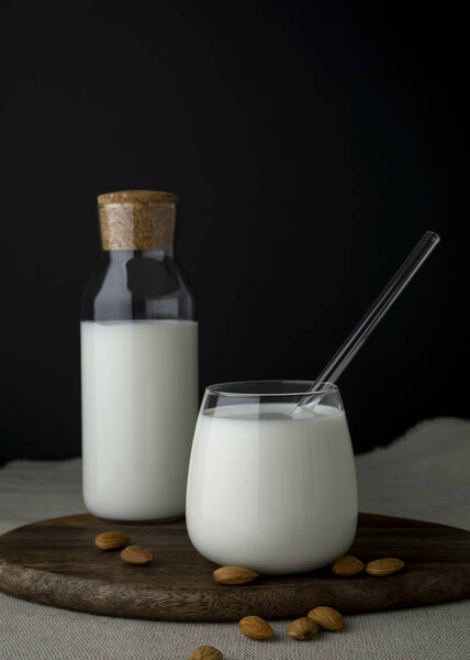 Glass with milk and a bottle with milk