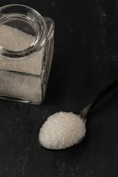 Sugar in spoon and in jar — 스톡 사진