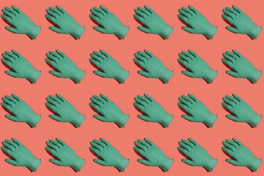 Renkli desen: kırmızı arka planda yeşil tıbbi eldiven..