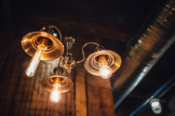 View on hanging wintage light bulbs, edison style light