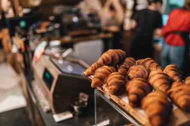 close up view on fresh croissants in coffee shop