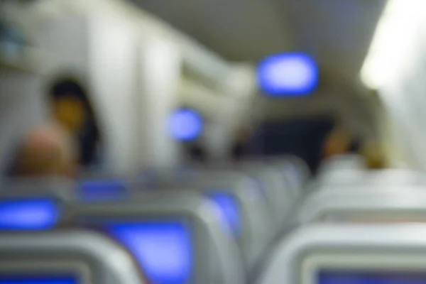 Imagen borrosa del pasajero en el avión . — Foto de Stock