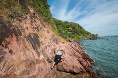 pembe taş beach, Chanthaburi Tayland kadın tırmanış