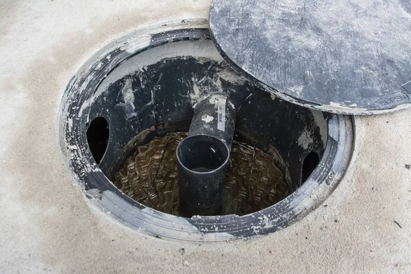 in side of waste treatment tank or septic tank installation  in