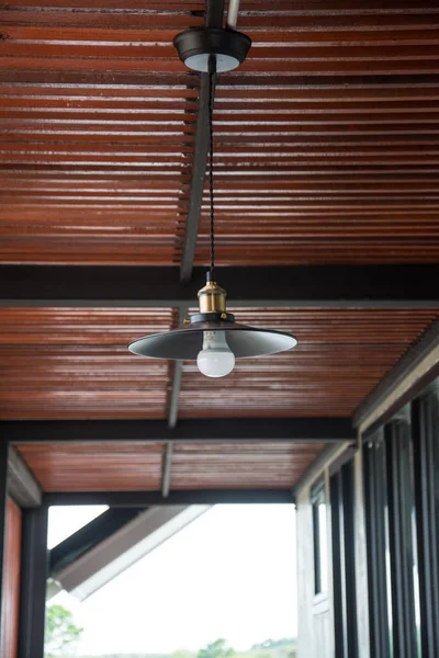 Modern lamp with wood ceiling
