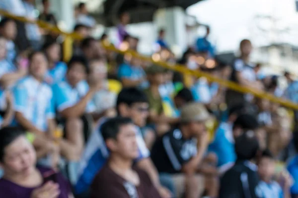 Fondo desenfocado de fútbol o estadio de fútbol en el crepúsculo, T —  Fotos de Stock