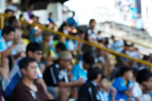 Fondo desenfocado de fútbol o estadio de fútbol en el crepúsculo, T —  Fotos de Stock