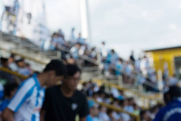 Fondo desenfocado de fútbol o estadio de fútbol en el crepúsculo, T —  Fotos de Stock