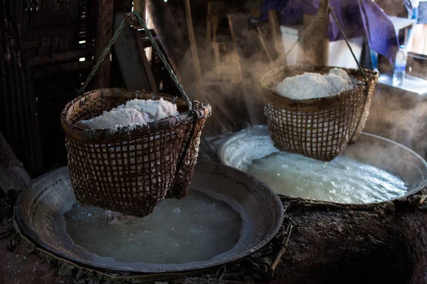 Raditional salt making by boiling underground salt water from na — Stock Photo, Image