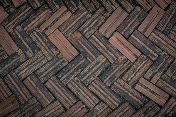 Pedras de pavimentação de tijolo vermelho em uma calçada — Fotografia de Stock