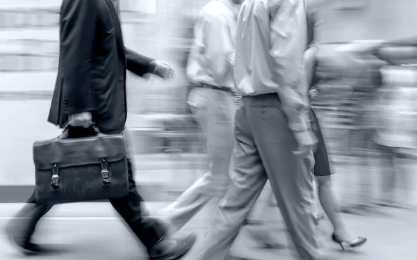 Group of business people in the street in blue tonality — Stock Photo, Image