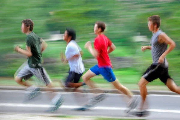 Atleet loper op stad straat — Stockfoto