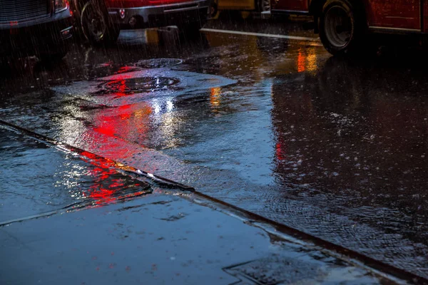 Colorful reflections of lights in the rain — Stock Photo, Image