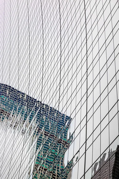 Futuristic glass building with economic cooperation — Stock Photo, Image