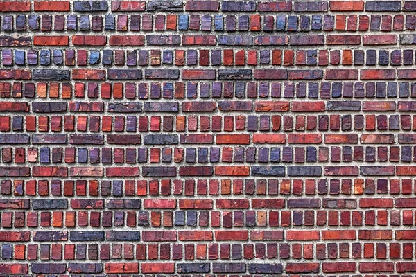 Die alte rote Backsteinmauer — Stockfoto