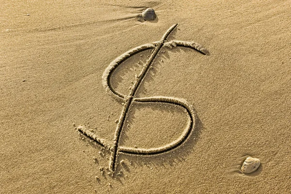 Symbol dolaru nakreslený v písku — Stock fotografie