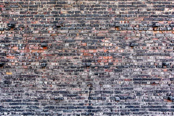 Ο παλιός τοίχος από κόκκινα τούβλα — Φωτογραφία Αρχείου